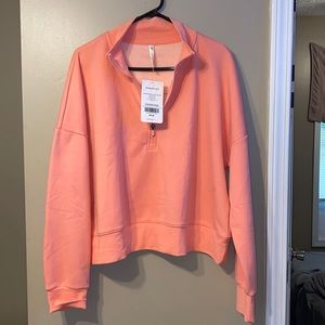 Brand new women’s fabletics Half zip pull over